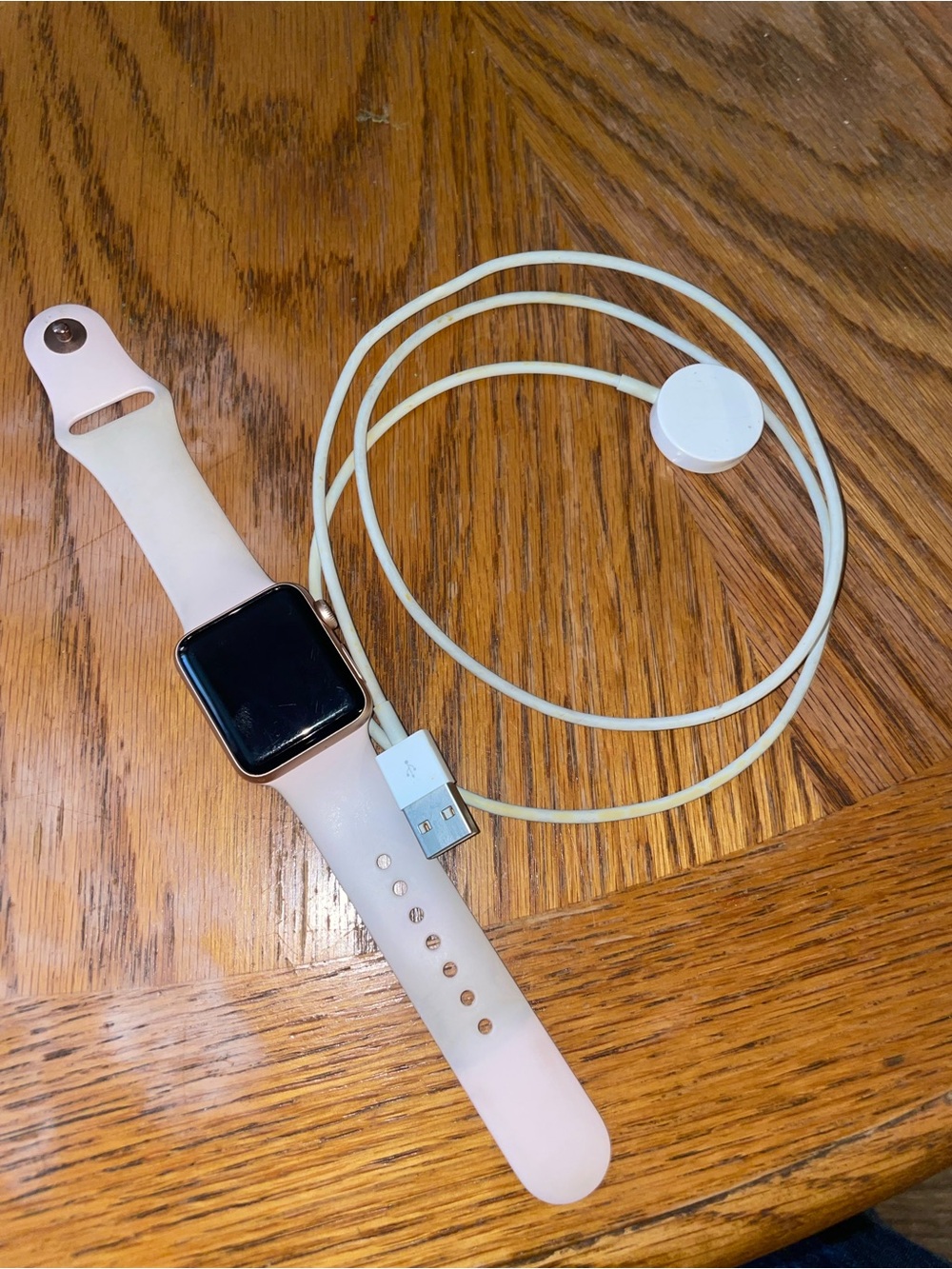 Apple Watch Rose Gold with Pink Sand Sport Band and Charging Cable